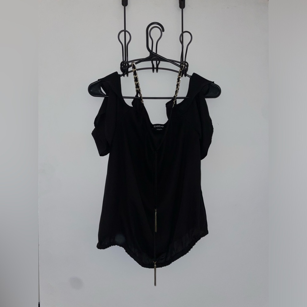 Bebe Black and gold chain with sleeve hanging blouse size small